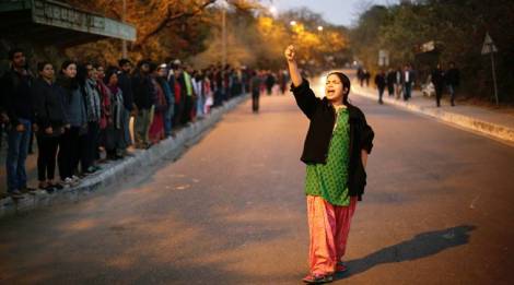 A student shouts slogans even as JNU teachers and students form a human chain inside the campus in protest against arrest of JNUSU President Kanhaiya Kumar on Sunday. Express photo by Oinam Anand. 14 February 2016